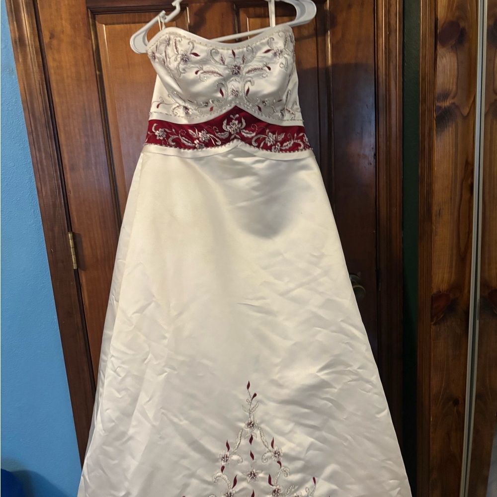 Mori Lee White and Burgundy Embroidered Wedding Dress with long detailed train.
